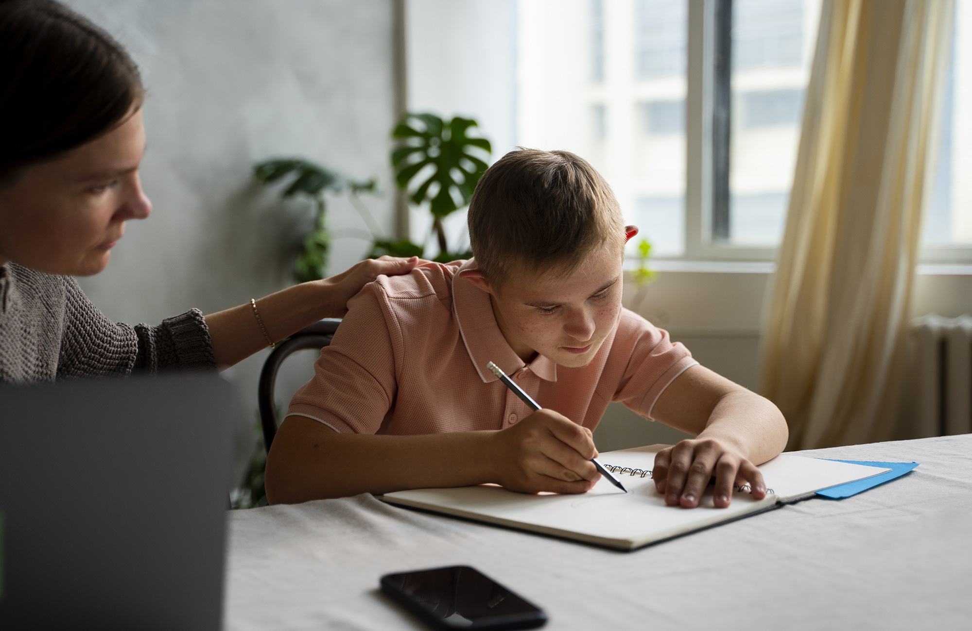 side-view-boy-woman-with-laptop