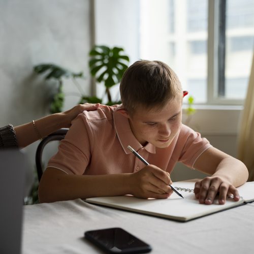 side-view-boy-woman-with-laptop